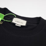 GG Graphic T-shirt with Cartoon Black Logo - Image 6