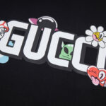 GG Graphic T-shirt with Cartoon Black Logo - Image 4